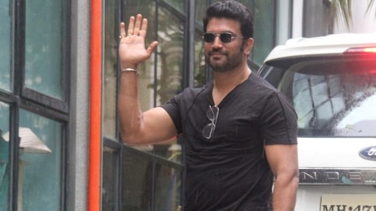 Sharad Kelkar waves to the paparazzi.