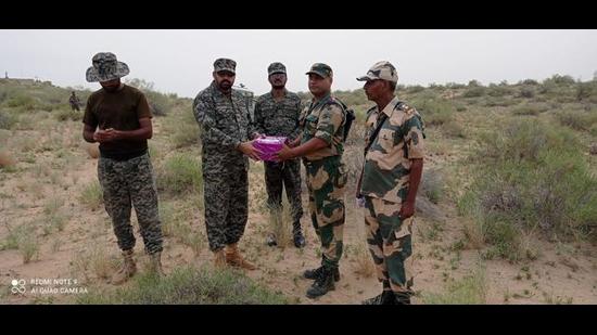 India and Pakistan took part in “sweets diplomacy” along the international border on the festival of Eid-al-Adha on Wednesday. (Sourced) India and Pakistan took part in “sweets diplomacy” along the international border on the festival of Eid-al-Adha on Wednesday. (Sourced)