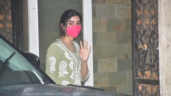 Khushi Kapoor waves to the photographers at her pilates class.