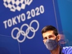 Tokyo Olympics: Novak Djokovic of Serbia wears a protective face mask during the press conference 