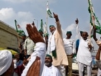 BKU spokesperson and farmer leader Rakesh Tikait addresses a gathering on the eve of 'Kisan Parliament' at Ghazipur (Delhi-UP border), near New Delhi, India, on Wednesday, July 21, 2021. 