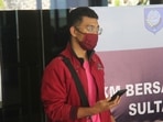 In this July 18 photo, a man who used a fake identity arrives at the Sultan Babullah airport in Ternate, Indonesia. The man with the coronavirus boarded a domestic flight disguised as his wife, wearing a niqab covering his face and carrying fake IDs and a negative PCR test result. He was arrested upon landing. (AP PHOTO) In this July 18 photo, a man who used a fake identity arrives at the Sultan Babullah airport in Ternate, Indonesia. The man with the coronavirus boarded a domestic flight disguised as his wife, wearing a niqab covering his face and carrying fake IDs and a negative PCR test result. He was arrested upon landing. (AP PHOTO)