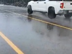The image shows fake rain created in Dubai.