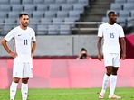 Teji Savanier (L) and Modibo Sagnan of France look on. 