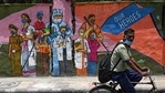 A cyclist passes by a wall mural depicting frontline Covid-19 coronavirus workers, in New Delhi on June 29 (AFP). A cyclist passes by a wall mural depicting frontline Covid-19 coronavirus workers, in New Delhi on June 29 (AFP).