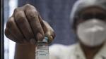 A health worker shows a vaccine dose. No unusual spike in cases from ‘Delta plus areas’ in the state. (HT) A health worker shows a vaccine dose. No unusual spike in cases from ‘Delta plus areas’ in the state. (HT)