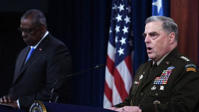 US defence secretary Lloyd Austin (left) and chairman of the joint chiefs of staff, General Mark Milley, address a press conference at The Pentagon in Washington, DC, on Wednesday. (AFP)