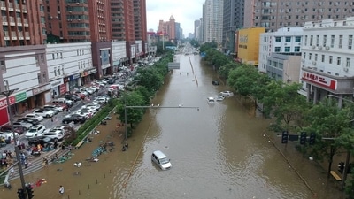 An aerial view shows a flooded road section following heavy rainfall in Zhengzhou, Henan province, on July 21. China Daily. (File Photo / REUTERS)