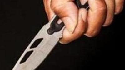 Evil criminal with large sharp knife ready for robbery or to commit a homicide (knife attack, shutterstock) (HT FILE)