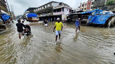 Waterlogging at Shelar village in Bhiwandi on Thursday. (Praful Gangurde/HT photo)