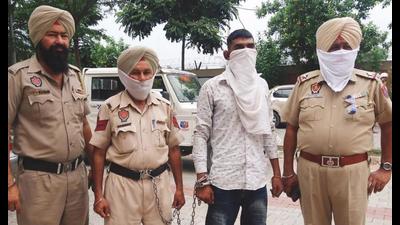 Serial killer held with 1kg heroin from Patti Serial killer held with 1kg heroin from Patti