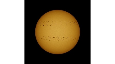Using a DSLR camera, telephoto lens and camera filter, Soumyadeep Mukherjee, 27, has been documenting activity on the sun for over 200 days. This image, a composite of images taken over 150 days, shows the movement of sun spots, the coolest areas on the burning star. (Photo by Soumyadeep Mukherjee)