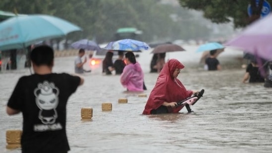 China has also been hit by heavy rains and flooding that resulted in at least 25 deaths in the province of Henan.(Via Reuters)