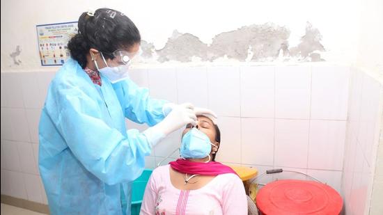 Even as the pandemic’s figures are receding steadily, health experts have been cautioning residents against letting their guard down. (HT FILE) Even as the pandemic’s figures are receding steadily, health experts have been cautioning residents against letting their guard down. (HT FILE)