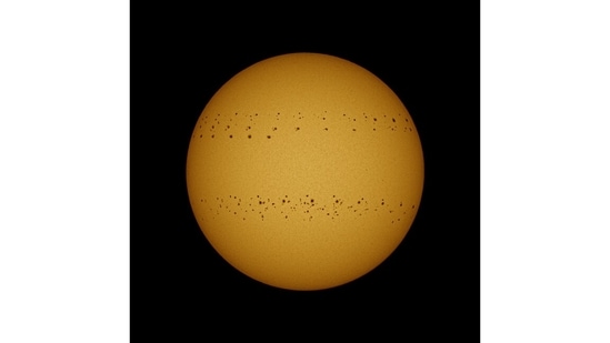 Using a DSLR camera, telephoto lens and camera filter, Soumyadeep Mukherjee, 27, has been documenting activity on the sun for over 200 days. This image, a composite of images taken over 150 days, shows the movement of sun spots, the coolest areas on the burning star.(Photo by Soumyadeep Mukherjee)