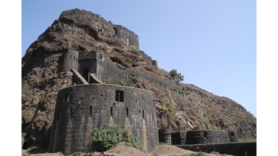 Maharashtra’s many, massive, centuries-old forts are built from stone and are seemingly impervious to time. Many stand just as they did when they were built, despite centuries of neglect. They’re scattered across the region — atop mountains in the foothills of the Sahyadris, on an island in the Arabian Sea. Fourteen forts are part of the Unesco nomination, all associated with the warrior-king Shivaji (1630 - 1680). They include the forts at Raigad and Rajgad, both of which served as Maratha capitals; Shivaji’s birthplace at Shivneri; the hilltop Torna Fort in Pune district, famously captured by Shivaji at 16; and one of the world’s finest examples of sea-fort architecture, the Kolaba fort at Alibaug. Maharashtra’s many, massive, centuries-old forts are built from stone and are seemingly impervious to time. Many stand just as they did when they were built, despite centuries of neglect. They’re scattered across the region — atop mountains in the foothills of the Sahyadris, on an island in the Arabian Sea. Fourteen forts are part of the Unesco nomination, all associated with the warrior-king Shivaji (1630 - 1680). They include the forts at Raigad and Rajgad, both of which served as Maratha capitals; Shivaji’s birthplace at Shivneri; the hilltop Torna Fort in Pune district, famously captured by Shivaji at 16; and one of the world’s finest examples of sea-fort architecture, the Kolaba fort at Alibaug.