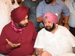 Newly appointed Congress chief Navjot Singh Sidhu and Punjab CM Captain Amarinder Singh, at Punjab Bhawan in Chandigarh.