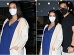 Neha Dhupia, who is pregnant with her second child, was snapped by the paparazzi in Mumbai last night. She enjoyed the night out with her husband, Angad Bedi.