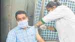 A resident receiving the jab at Government Model Senior Secondary School, Sector 45, in Chandigarh on Friday. (KESHAV SINGH/HT) A resident receiving the jab at Government Model Senior Secondary School, Sector 45, in Chandigarh on Friday. (KESHAV SINGH/HT)