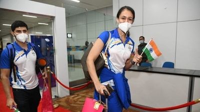 Table Tennis player Manika Batra along with other players departs from Delhi Airport for Tokyo Olympics during the sending-off ceremony, in New Delhi on Saturday. (ANI Photo) Table Tennis player Manika Batra along with other players departs from Delhi Airport for Tokyo Olympics during the sending-off ceremony, in New Delhi on Saturday. (ANI Photo)