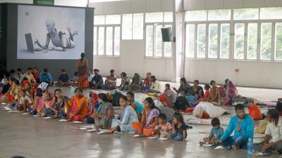 Residents in a school being used as a shelter after heavy rains led to Ulhas and Waldhuni rivers overflowing and flooding homes in Kalyan on July 22. In Raigad district, 400 people from Karjat, Mahad and Khalapur tehsils were shifted, officials said. (Rishikesh Choudhary / HT Photo) Residents in a school being used as a shelter after heavy rains led to Ulhas and Waldhuni rivers overflowing and flooding homes in Kalyan on July 22. In Raigad district, 400 people from Karjat, Mahad and Khalapur tehsils were shifted, officials said. (Rishikesh Choudhary / HT Photo)