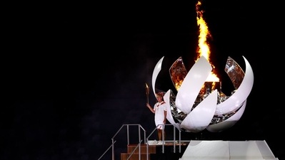 At last, Osaka lit the Olympic cauldron as the Games opened. (AFP) At last, Osaka lit the Olympic cauldron as the Games opened. (AFP)