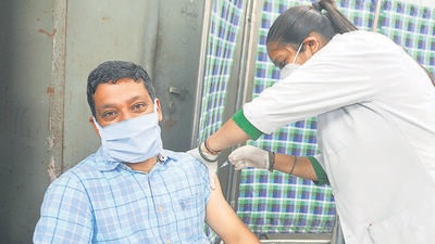 A resident receiving the jab at Government Model Senior Secondary School, Sector 45, in Chandigarh on Friday. (KESHAV SINGH/HT) A resident receiving the jab at Government Model Senior Secondary School, Sector 45, in Chandigarh on Friday. (KESHAV SINGH/HT)