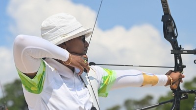 India's Deepika Kumari competes in the women's individual archery ranking round during the Tokyo 2020 Olympic Games at Yumenoshima Park Archery Field in Tokyo on July 23, 2021. (AFP) India's Deepika Kumari competes in the women's individual archery ranking round during the Tokyo 2020 Olympic Games at Yumenoshima Park Archery Field in Tokyo on July 23, 2021. (AFP)
