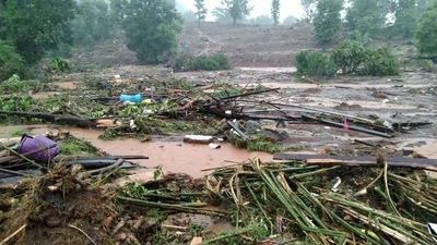 This picture released by the National Disaster Response Force (NDRF) shows debris of houses in Taliye village after a landslide in Mahad of Raigad district of Maharashtra. (NDRF / AFP) This picture released by the National Disaster Response Force (NDRF) shows debris of houses in Taliye village after a landslide in Mahad of Raigad district of Maharashtra. (NDRF / AFP)