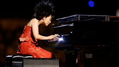 Japanese pianist Hiromi performs during the opening ceremony of the Tokyo 2020 Olympic Games, at the Olympic Stadium, in Tokyo, (AFP) Japanese pianist Hiromi performs during the opening ceremony of the Tokyo 2020 Olympic Games, at the Olympic Stadium, in Tokyo, (AFP)