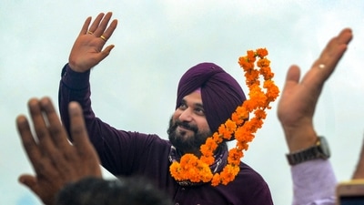 Newly appointed Punjab Pradesh Congress Committee president Navjot Singh Sidhu being welcomed by supporters during his visit to Amritsar, on Tuesday, July 20, 2021. (PTI) Newly appointed Punjab Pradesh Congress Committee president Navjot Singh Sidhu being welcomed by supporters during his visit to Amritsar, on Tuesday, July 20, 2021. (PTI)