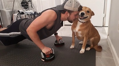 The dog named Chelsea doing everything in her power to stop her human from working out. (Reddit/iamtheliquor__) The dog named Chelsea doing everything in her power to stop her human from working out. (Reddit/iamtheliquor__)