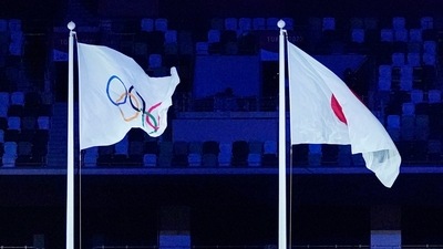The Tokyo 2020 Olympics opening ceremony: The Olympic flag, while the Japanese national anthem was being sung, was hoisted next to the national flag. (AFP) The Tokyo 2020 Olympics opening ceremony: The Olympic flag, while the Japanese national anthem was being sung, was hoisted next to the national flag. (AFP)