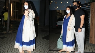 Neha's dress came with a plunging neckline and double straps. The dark blue attire featured the tie-dye detail on the hem in white and pink hues. The actor teamed her midi with a full-sleeve, blush pink hooded trench coat. (Varinder Chawla) Neha's dress came with a plunging neckline and double straps. The dark blue attire featured the tie-dye detail on the hem in white and pink hues. The actor teamed her midi with a full-sleeve, blush pink hooded trench coat. (Varinder Chawla)