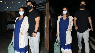 Angad Bedi complemented his wife in a simple street-style-ready look. He wore a black T-shirt with grey joggers, a black face mask and strappy sandals for the outing. The couple chose relaxed fits for their date. (Varinder Chawla)