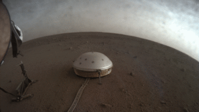 Clouds drift over the dome-covered seismometer, known as SEIS, belonging to NASA's InSight lander, on Mars. (NASA/JPL-Caltech) Clouds drift over the dome-covered seismometer, known as SEIS, belonging to NASA's InSight lander, on Mars. (NASA/JPL-Caltech)