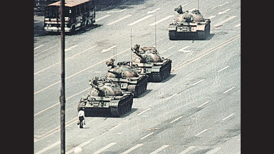Iconic image. A lone demonstrator blocks the path of a tank convoy along the Avenue of Eternal Peace near Tiananmen Square in June 1989. (Getty Images) Iconic image. A lone demonstrator blocks the path of a tank convoy along the Avenue of Eternal Peace near Tiananmen Square in June 1989. (Getty Images)