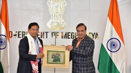 Meghalaya CM Conrad Sangma (left) and his Assam counterpart Himanta Biswa Sarma at Shillong on Friday. (Twitter/Himanta Biswa Sarma)