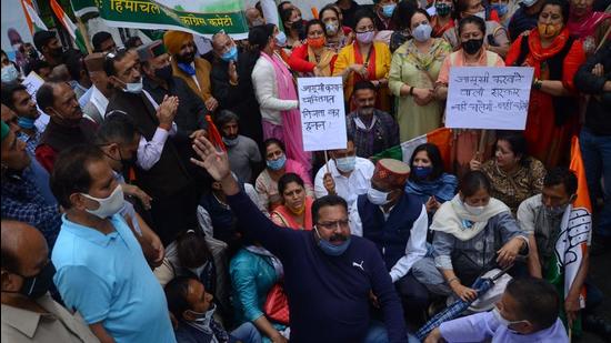 Congress leaders and members staging a protest outside Raj Bhawan in Shimla on Friday. (Deepak Sansta/HT)