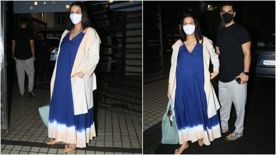 Neha donned a strappy tie-dye maxi dress for her dinner date with Angad and looked stunning. The pregnant actor looked glorious in her effortless ensemble. New mommies can definitely take some styling cues from her.(Varinder Chawla)