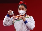 Tokyo 2020 Olympics - Weightlifting - Women's 49kg - Medal Ceremony - Tokyo International Forum, Tokyo, Japan - July 24, 2021. Silver medalist Mirabai Chanu Saikhom of India reacts. REUTERS/Edgard Garrido(REUTERS)