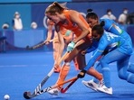 Tokyo 2020 Olympics - Hockey - Women's Pool A - Netherlands v India - Oi Hockey Stadium, Tokyo, Japan - July 24, 2021. Felice Albers of the Netherlands in action with Nisha of India.