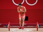 Weightlifter Mirabai Chanu during the Women's 49kg category weightlifting attempt as she wins a silver medal at Tokyo Olympics 2020, in Tokyo on Saturday.(ANI Photo) Weightlifter Mirabai Chanu during the Women's 49kg category weightlifting attempt as she wins a silver medal at Tokyo Olympics 2020, in Tokyo on Saturday.(ANI Photo)