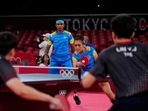 India's Kamal Achanta, left, and Manika Batra compete during table tennis mixed doubles round of 16 match against Taiwan's Lin Yun-Ju and Cheng I-ching at the 2020 Summer Olympics.