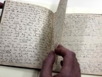 Original manuscripts written in German by Jewish German-speaking novelist and story writer Franz Kafka are now online for the first time, following an intensive years-long process of conservation and restoration work, cataloguing and digitisation of the work of one of the major figures of 20th-century literature.(Photo by MENAHEM KAHANA / AFP) Original manuscripts written in German by Jewish German-speaking novelist and story writer Franz Kafka are now online for the first time, following an intensive years-long process of conservation and restoration work, cataloguing and digitisation of the work of one of the major figures of 20th-century literature.(Photo by MENAHEM KAHANA / AFP)