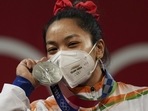 India's Mirabai Chanu poses with her silver medal at the Summer Olympics 2020