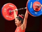 India's Mirabai Chanu competes in the women's 49kg weightlifting competition at the Tokyo Olympics. (Getty Images) India's Mirabai Chanu competes in the women's 49kg weightlifting competition at the Tokyo Olympics. (Getty Images)