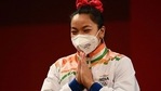 Silver medallist India's Mirabai Chanu gestures on the podium. (Getty Images) Silver medallist India's Mirabai Chanu gestures on the podium. (Getty Images)