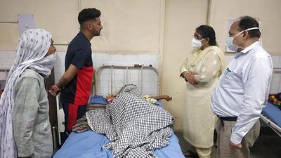 Sangrur civil surgeon Dr Anjana Gupta meets a patient at Bhawanigarh government hospital on Saturday. (HT Photo)