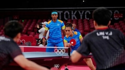 India's Kamal Achanta, left, and Manika Batra compete during table tennis mixed doubles round of 16 match against Taiwan's Lin Yun-Ju and Cheng I-ching at the 2020 Summer Olympics. (AP)